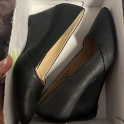 Size 9 Woman’s Black Wedge Shoes .$30
