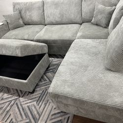 Beautiful gray living room set with ottoman and Storage  , with USB charger , new!