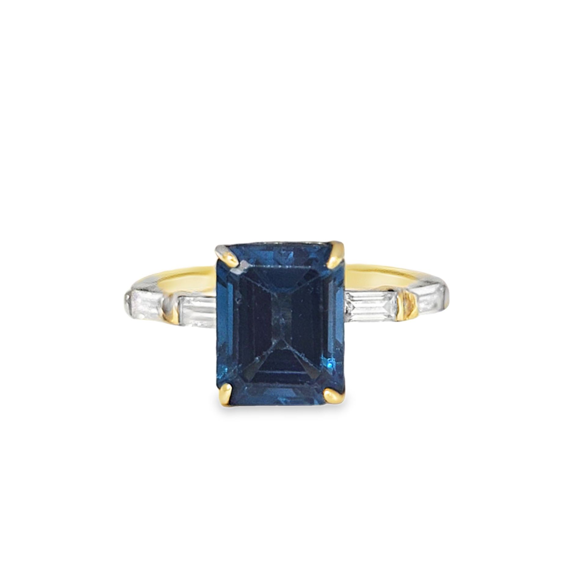 10k Yellow Gold Emerald Cut Blue Topaz Ring