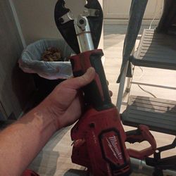 is a Milwaukee M18 FORCE LOGIC Cable Cutter.