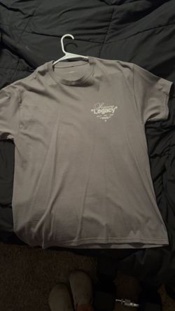 Gray Legacy T-shirt with white text reading 'Legacy' and 'Legacy' in quotes #legacy #graphic