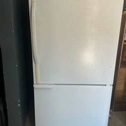 Refrigerator $300 (Cleaning It Out)