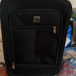 Small black suitcase in very good condition without any damage