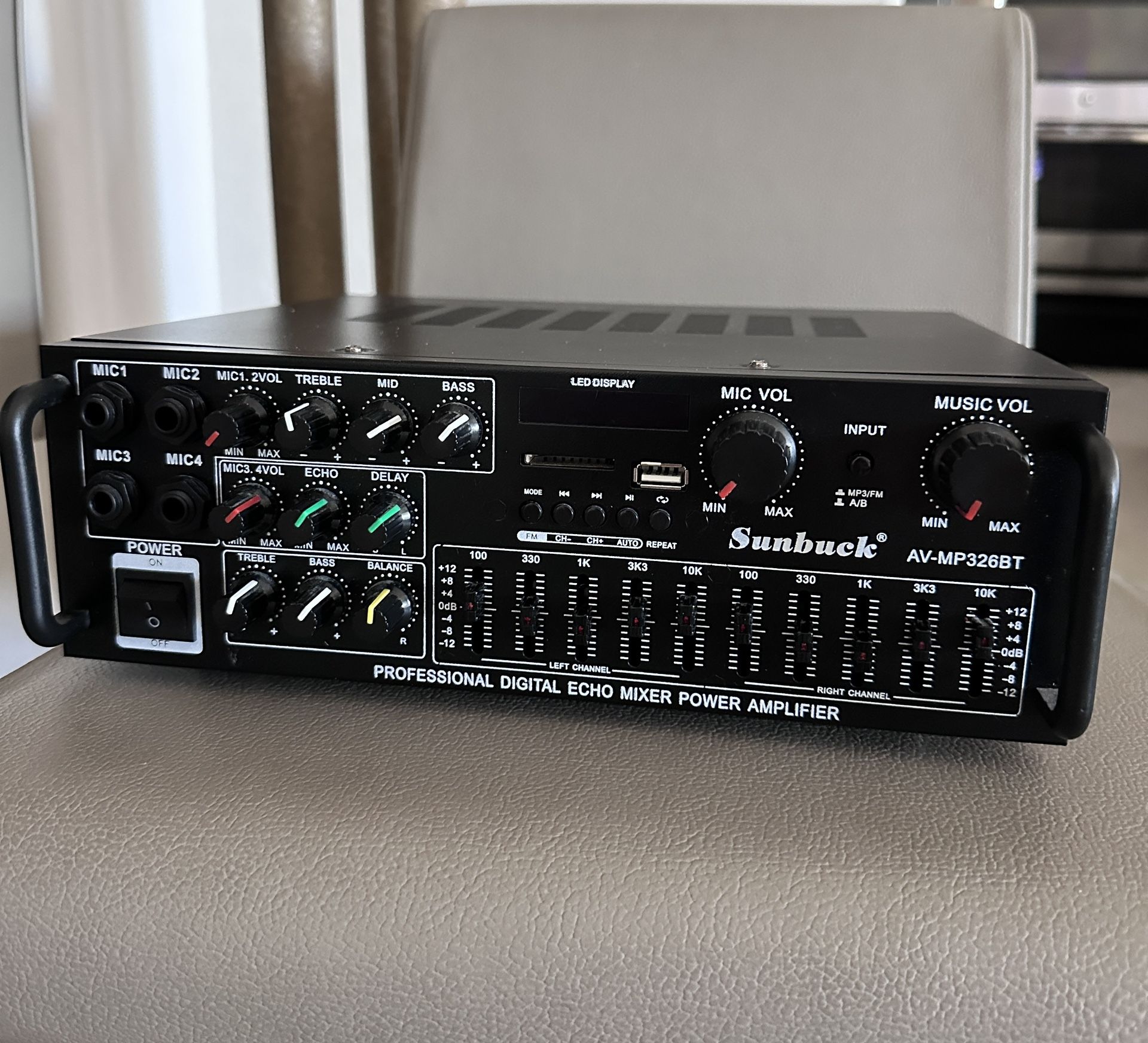 Sunbuck AV-MP326BT, a 2-channel budget home theater / karaoke power amplifier featuring built-in Bluetooth, a 10-band graphic equalizer, and 4 microph