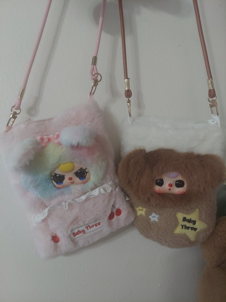 Collectibe phone purses. Brown