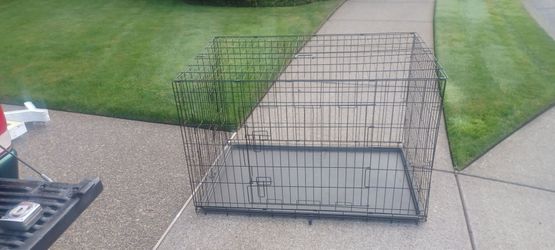 Extra large pet crate dog crate. Two doors. Like new condition