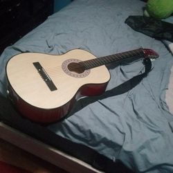 Acoustic Guitar And Bag