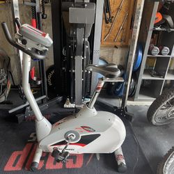 Like new Schwinn Upright Exercise Bike - can possibly deliver.   Multiple levels of resistance and user programs. Smooth, powerful, and quiet resistan