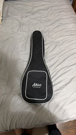 concert-size acoustic-electric ukulele.