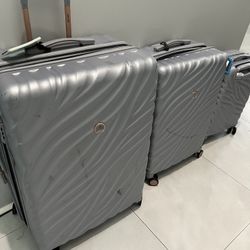 Delsey Paris Alexis Expandable Spinners. 22” carryon, 26” & 30”. Luggage. Jupiter 