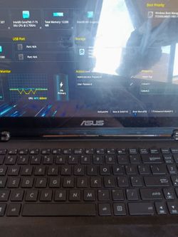 AsusQ524U i7 touchscreen laptop firm Price