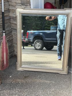 Large wall mirror. Gold color frame.