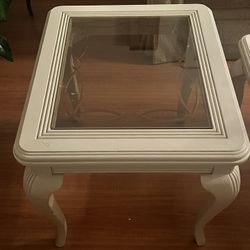 Light wooden coffee and end table with glass