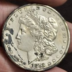 1878 S Morgan Silver Dollar With 7TF, Has A Stain Because Of The Way It Was Stored Otherwise It Looks In Excellent Condition- FIRM PRICE 