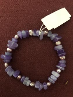 Purple stones on expandable bracelet new in the box