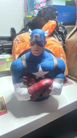 Captain America coin bank/ 18 marvel comics (Spider-Man/iron man etc)/ 3 DC and Marvel cards