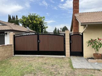 Iron Gates And Fence With Composite Wood 
