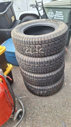 LIKE NEW TIRES 235/65/16  STUDDED SNOW TIRES