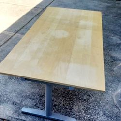 Beautiful Caramel colored conference table. Strong metal legs. Great for parties and gatherings. Work Desk. Office Furniture. 