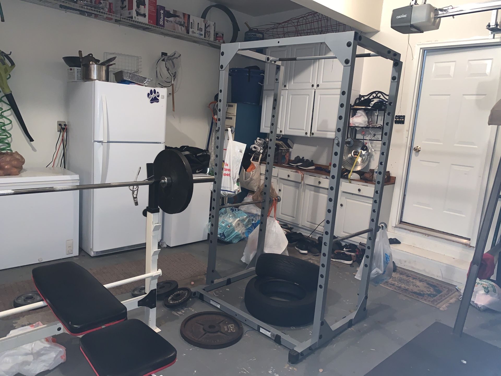 Bench and squat cage with pull up bar and olympic bar
