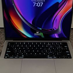 MacBook Pro 14” M4 Pro - 24gb RAM / 512gb Storage - AppleCare+ 2028 - w/charging cord, case, and bag.