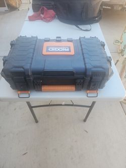 Rigid toolbox and cand contents