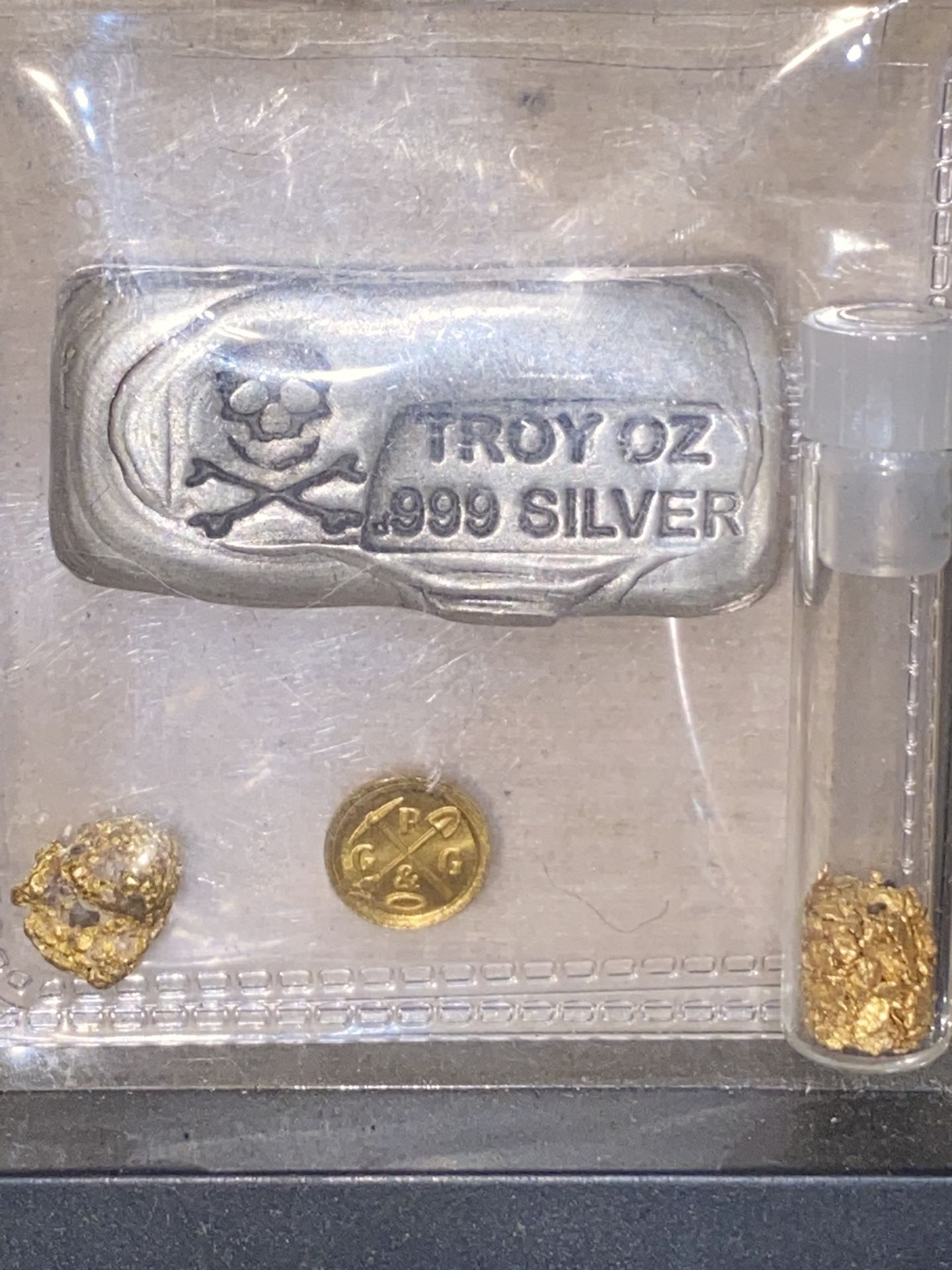 1/2 g prospector gold round 1 g and a half loose nuggets with a 1.2 g solid nugg