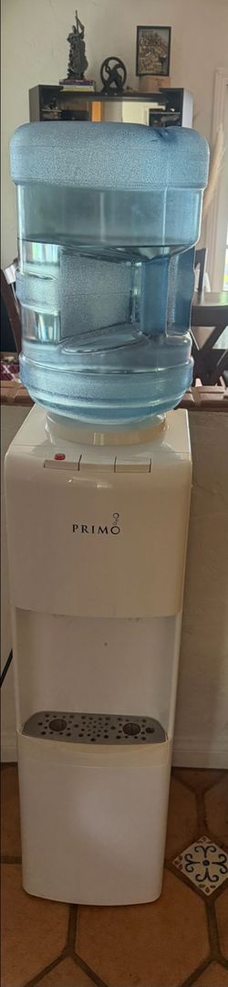 Water dispenser and a bottle