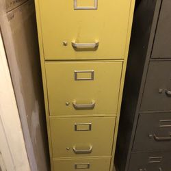 File cabinet mustard color five drawer or four drawer cabinet