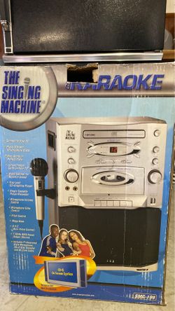 Karaoke machine with microphone