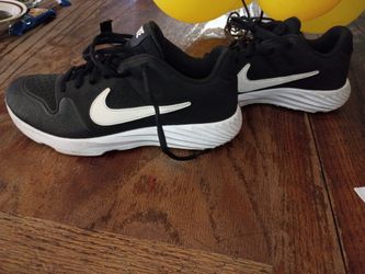 Nike Kid Size Shows In The Picture Like New