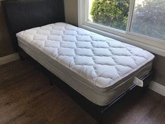 Twin bed and black Upholstered frame like new