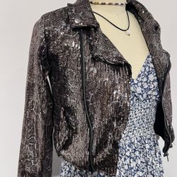 Sequin Jacket For Girls Ages 9 To 10 Years Old. The Jacket Has Lining The Color Is Gold And Brown Tones With A Snake Pattern Sequin Shiny.