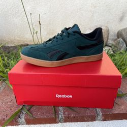 Reebok smash edge tennis Kids.kids size 6.5 black and green 