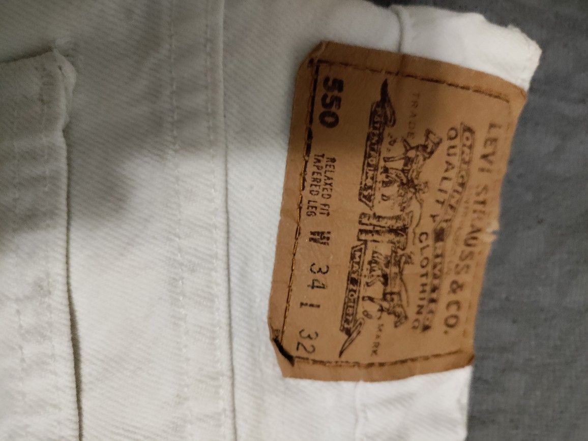 Levi's 550 Orange Tag Jeans. White Rivets.