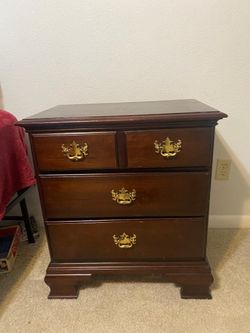 Dark Wood 4-Drawer Chest with Brass Hardware