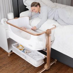 KoolerThings Baby Bassinet, Bedside Sleeper for Baby, Easy Folding Portable Crib  Open box item is new!  The KoolerThings Baby Bassinet is a portable 