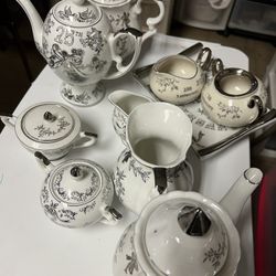  25th Anniversary Drinking Set With  3 Kattle 2 Creamer And 2 Augers Plus Platinum 2 Pieces And Tray.