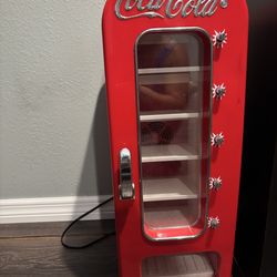 Moving sale Coca Cola machine good for  10 cans