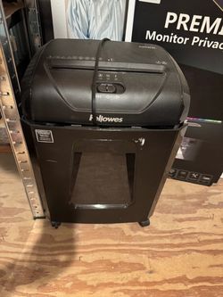 Fellowes Powershred 1200C 12-sheet cross-cut paper shredder featuring a front waste-bin window and top control switches.Capacity & Cut Type: Cross-cut