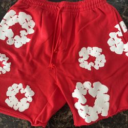 red denim tear shorts 