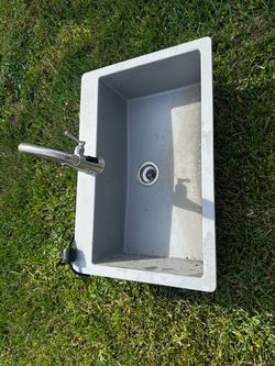 Outdoor sink with faucet
