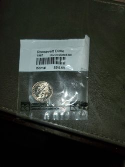 UNCIRCULATED ROOSEVELT DIME. 1967. MINT CONDITION FULL BANDS.