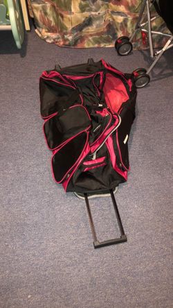 Black and Pink Rolling Duffle Bag