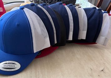 14 Yupoong snapback hats