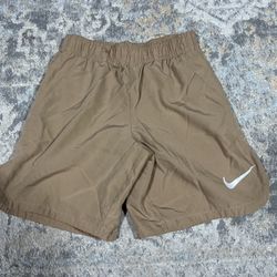 Tan Nike Dri-Fit shorts Kids size S (4/5 years old)
