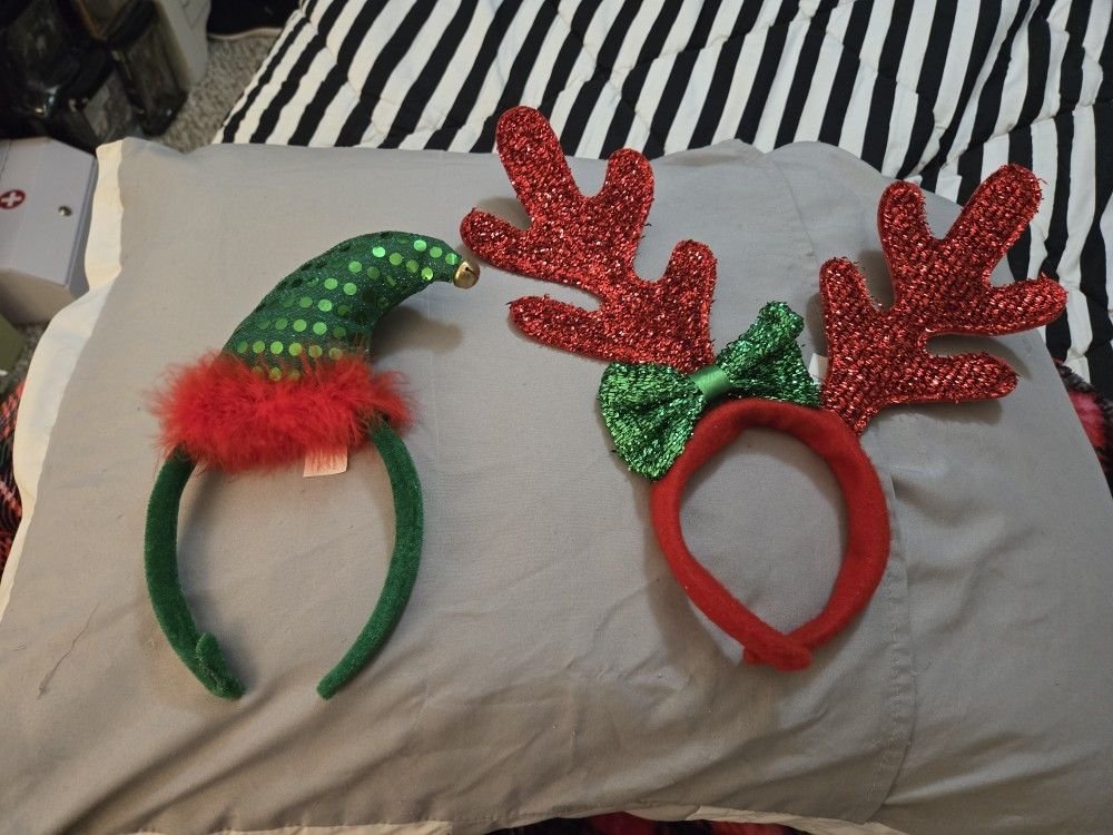 New. (2) Christmas Character Headbands.