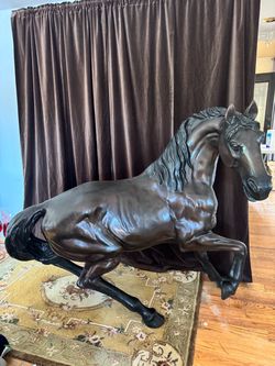 Life-sized bronze horse sculpture by PJ Mene