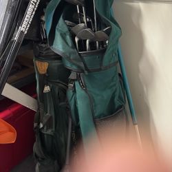 Two Sets Of Golf Clubs
