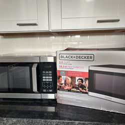 MOVING FRIDAY! Microwave For Sale. 